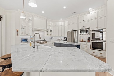 Welcome to 820 Preservation Circle! Tucked behind the gates of on The Reserve Golf Club at Pawleys Island in South Carolina - for sale on GolfHomes.com, golf home, golf lot