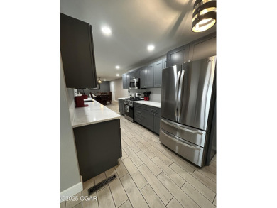 Completely remodeled golf course home offering 2,147 sq. ft. of on Baxter Country Club in Kansas - for sale on GolfHomes.com, golf home, golf lot