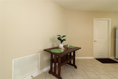 REDUCED PRICE, NOW INCLUDES GOLF CART.  Welcome in to this on The Links of Spruce Creek in Florida - for sale on GolfHomes.com, golf home, golf lot