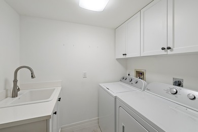 Experience effortless luxury and serene golf course views on the on Jonathans Landing Golf Club in Florida - for sale on GolfHomes.com, golf home, golf lot