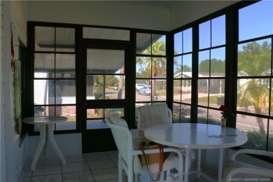 Delightful furnished home featuring wood laminate flooring on Indianwood Golf and Country Club in Florida - for sale on GolfHomes.com, golf home, golf lot