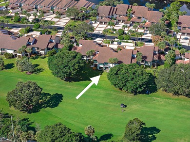 Experience effortless luxury and serene golf course views on the on Jonathans Landing Golf Club in Florida - for sale on GolfHomes.com, golf home, golf lot