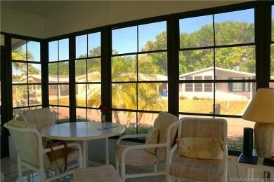 Delightful furnished home featuring wood laminate flooring on Indianwood Golf and Country Club in Florida - for sale on GolfHomes.com, golf home, golf lot