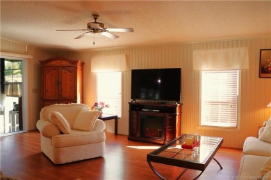 Delightful furnished home featuring wood laminate flooring on Indianwood Golf and Country Club in Florida - for sale on GolfHomes.com, golf home, golf lot