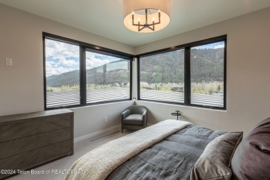 Lodge Cabin, Meadow: This exquisite property offer stunning on Snake River Sporting Club in Wyoming - for sale on GolfHomes.com, golf home, golf lot