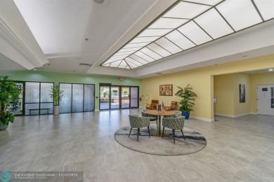 This 4th-floor 55+ penthouse condo offers spectacular views of on Sunrise Lakes Phase III in Florida - for sale on GolfHomes.com, golf home, golf lot