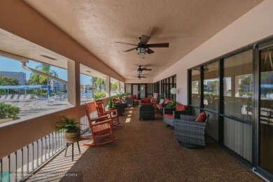 This 4th-floor 55+ penthouse condo offers spectacular views of on Sunrise Lakes Phase III in Florida - for sale on GolfHomes.com, golf home, golf lot