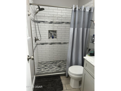 Completely remodeled golf course home offering 2,147 sq. ft. of on Baxter Country Club in Kansas - for sale on GolfHomes.com, golf home, golf lot