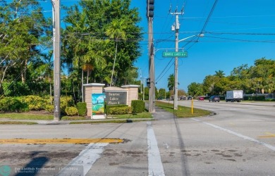 This 4th-floor 55+ penthouse condo offers spectacular views of on Sunrise Lakes Phase III in Florida - for sale on GolfHomes.com, golf home, golf lot