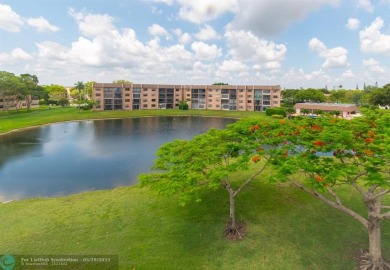 SUNRISE LAKES with the most beautiful remodel and sprawling on Sunrise Lakes Phase III in Florida - for sale on GolfHomes.com, golf home, golf lot