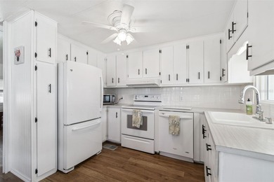 Cozy Beach-Cottage Vibes in Fairway Village -- Where the Living on Fairway Village Golf Course in Florida - for sale on GolfHomes.com, golf home, golf lot