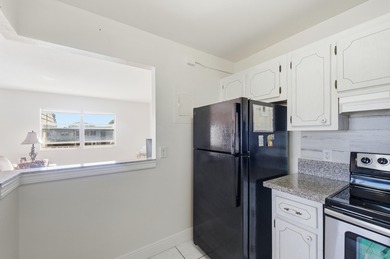 Beautiful corner unit with canal views pf community of Kings on Kings Point Golf -Flanders Way in Florida - for sale on GolfHomes.com, golf home, golf lot