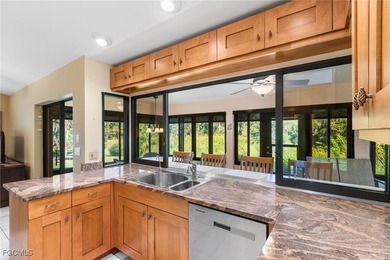 Welcome to your dream home with stunning GOLF & NATURE VIEWS in on Cross Creek Country Club in Florida - for sale on GolfHomes.com, golf home, golf lot