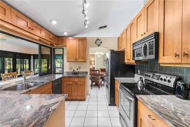 Welcome to your dream home with stunning GOLF & NATURE VIEWS in on Cross Creek Country Club in Florida - for sale on GolfHomes.com, golf home, golf lot