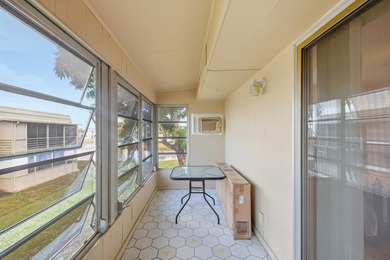 Beautiful corner unit with serene canal views in the highly on Kings Point Golf -Flanders Way in Florida - for sale on GolfHomes.com, golf home, golf lot