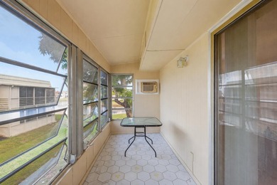 Beautiful corner unit with serene canal views in the highly on Kings Point Golf -Flanders Way in Florida - for sale on GolfHomes.com, golf home, golf lot