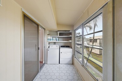 Beautiful corner unit with serene canal views in the highly on Kings Point Golf -Flanders Way in Florida - for sale on GolfHomes.com, golf home, golf lot