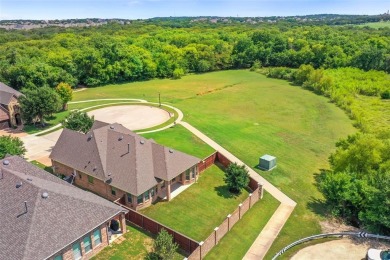 Welcome to this charming one-story home in the Abbey Moor on Trophy Club of Dallas in Texas - for sale on GolfHomes.com, golf home, golf lot