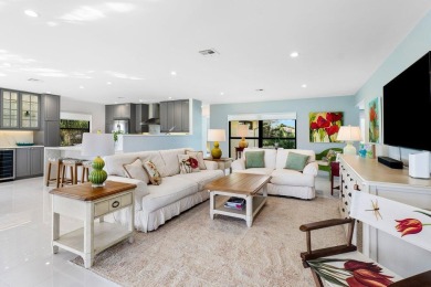 Welcome to this beautifully updated second-floor residence on Quail Ridge Golf Course and Country Club in Florida - for sale on GolfHomes.com, golf home, golf lot
