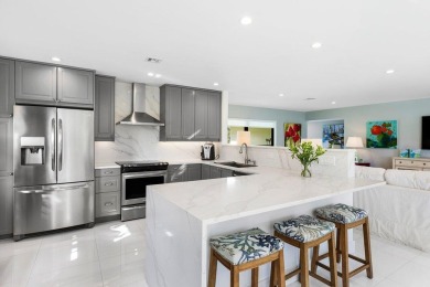 Welcome to this beautifully updated second-floor residence on Quail Ridge Golf Course and Country Club in Florida - for sale on GolfHomes.com, golf home, golf lot