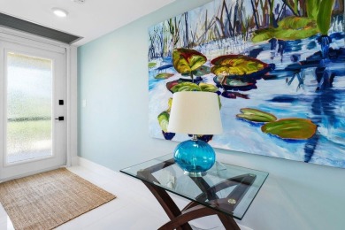 Welcome to this beautifully updated second-floor residence on Quail Ridge Golf Course and Country Club in Florida - for sale on GolfHomes.com, golf home, golf lot