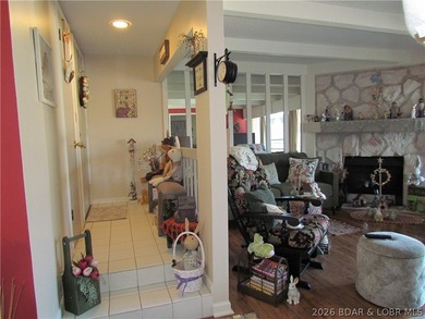 Top-floor waterfront condo featuring 3 bedrooms, 2 bathrooms on Seasons Ridge At Four Seasons in Missouri - for sale on GolfHomes.com, golf home, golf lot