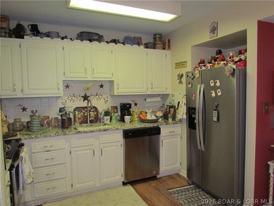 Top-floor waterfront condo featuring 3 bedrooms, 2 bathrooms on Seasons Ridge At Four Seasons in Missouri - for sale on GolfHomes.com, golf home, golf lot