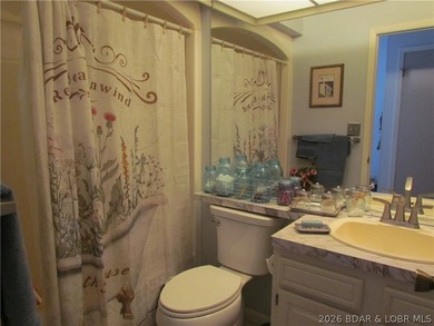 Top-floor waterfront condo featuring 3 bedrooms, 2 bathrooms on Seasons Ridge At Four Seasons in Missouri - for sale on GolfHomes.com, golf home, golf lot