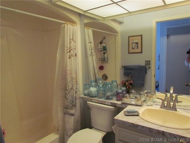 Top-floor waterfront condo featuring 3 bedrooms, 2 bathrooms on Seasons Ridge At Four Seasons in Missouri - for sale on GolfHomes.com, golf home, golf lot