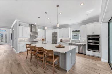 EXQUISITELY DESIGNED POOL HOME IN THE PREMIERE GOLF COMMUNITY OF on Esplanade Golf and Country at Lakewood Ranch in Florida - for sale on GolfHomes.com, golf home, golf lot