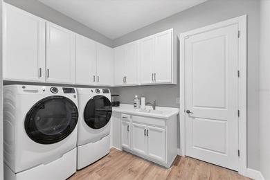 EXQUISITELY DESIGNED POOL HOME IN THE PREMIERE GOLF COMMUNITY OF on Esplanade Golf and Country at Lakewood Ranch in Florida - for sale on GolfHomes.com, golf home, golf lot