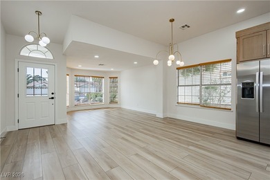 Welcome to this beautifully renovated home in the guard-gated on Los Prados Golf Course in Nevada - for sale on GolfHomes.com, golf home, golf lot