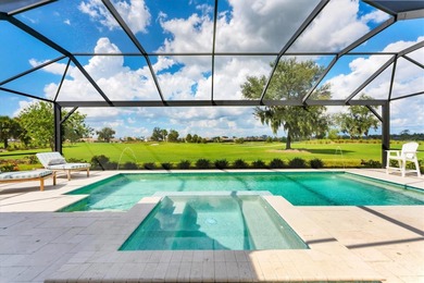 EXQUISITELY DESIGNED POOL HOME IN THE PREMIERE GOLF COMMUNITY OF on Esplanade Golf and Country at Lakewood Ranch in Florida - for sale on GolfHomes.com, golf home, golf lot