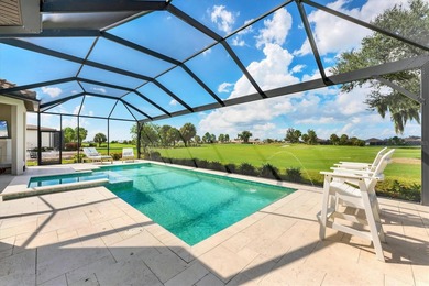 EXQUISITELY DESIGNED POOL HOME IN THE PREMIERE GOLF COMMUNITY OF on Esplanade Golf and Country at Lakewood Ranch in Florida - for sale on GolfHomes.com, golf home, golf lot