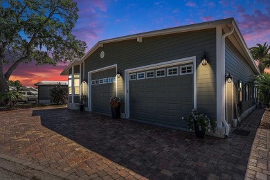 Introducing a captivating mobile home nestled in the serene on Silver Dollar Golf and Trap Club in Florida - for sale on GolfHomes.com, golf home, golf lot