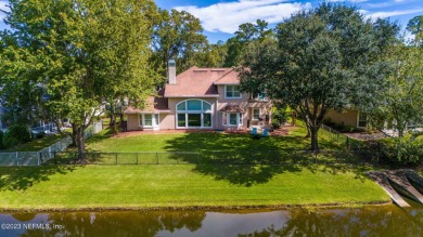 Discover your dream Florida lifestyle in this amazing lakefront on Eagle Harbor Golf Club in Florida - for sale on GolfHomes.com, golf home, golf lot