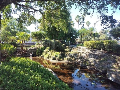 Charming pristine condo with 2 master suites and parking right on Quail Run Golf Club In Naples in Florida - for sale on GolfHomes.com, golf home, golf lot