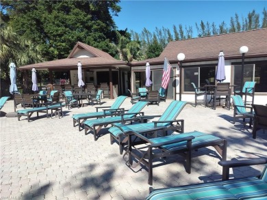 Charming pristine condo with 2 master suites and parking right on Quail Run Golf Club In Naples in Florida - for sale on GolfHomes.com, golf home, golf lot
