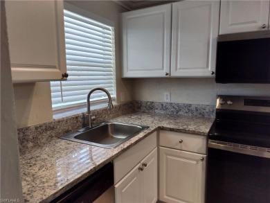 Charming pristine condo with 2 master suites and parking right on Quail Run Golf Club In Naples in Florida - for sale on GolfHomes.com, golf home, golf lot