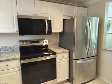 Charming pristine condo with 2 master suites and parking right on Quail Run Golf Club In Naples in Florida - for sale on GolfHomes.com, golf home, golf lot