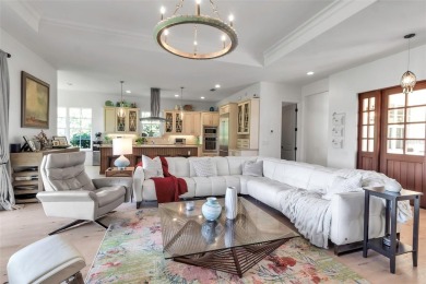 Welcome to timeless elegance and modern comfort in The Oaks on The Oaks Club in Florida - for sale on GolfHomes.com, golf home, golf lot