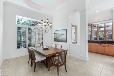 Immerse yourself in the ultimate expression of luxury living at on Shadow Wood Country Club in Florida - for sale on GolfHomes.com, golf home, golf lot