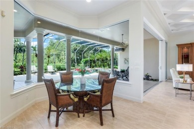 Immerse yourself in the ultimate expression of luxury living at on Shadow Wood Country Club in Florida - for sale on GolfHomes.com, golf home, golf lot