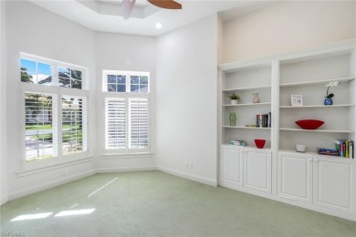 Immerse yourself in the ultimate expression of luxury living at on Shadow Wood Country Club in Florida - for sale on GolfHomes.com, golf home, golf lot
