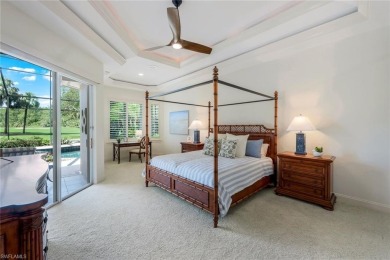 Immerse yourself in the ultimate expression of luxury living at on Shadow Wood Country Club in Florida - for sale on GolfHomes.com, golf home, golf lot