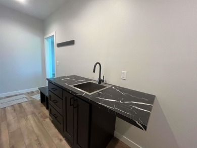 Check out this new build just a few blocks from the golf course on Sanborn Golf and Country Club in Iowa - for sale on GolfHomes.com, golf home, golf lot