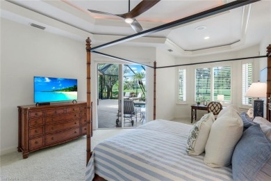 Immerse yourself in the ultimate expression of luxury living at on Shadow Wood Country Club in Florida - for sale on GolfHomes.com, golf home, golf lot