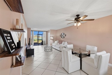 Welcome to resort-style living in the highly desirable Feather on Feather Sound Country Club in Florida - for sale on GolfHomes.com, golf home, golf lot