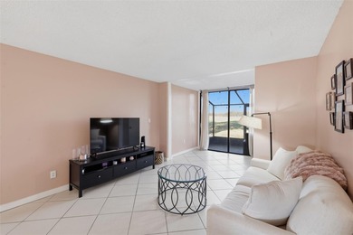 Welcome to resort-style living in the highly desirable Feather on Feather Sound Country Club in Florida - for sale on GolfHomes.com, golf home, golf lot