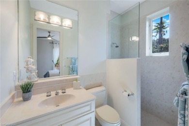 Immerse yourself in the ultimate expression of luxury living at on Shadow Wood Country Club in Florida - for sale on GolfHomes.com, golf home, golf lot